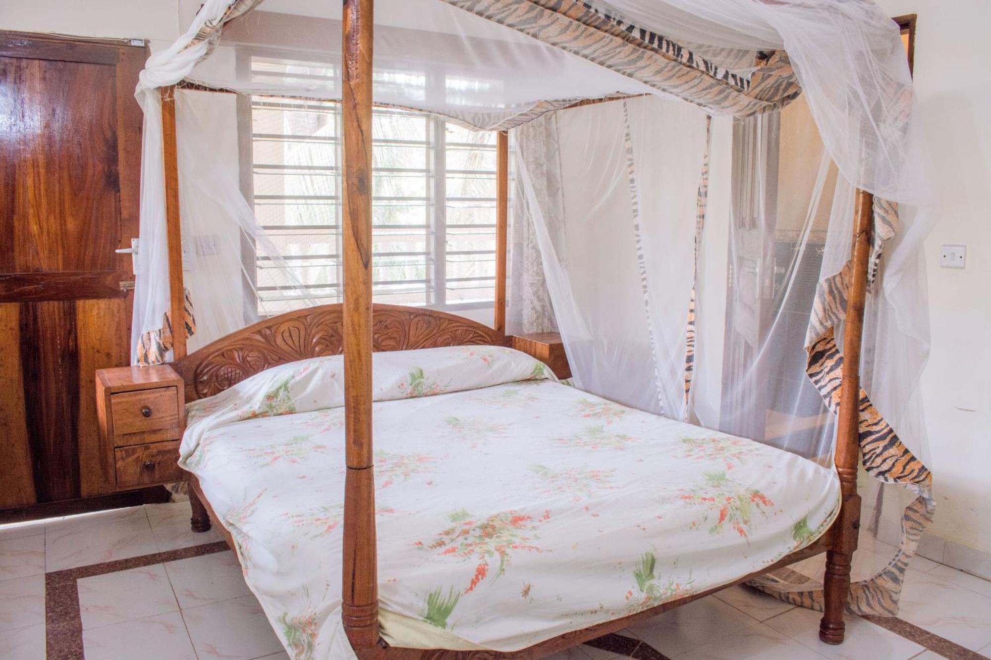 Kijani Cottages In Diani Диани-Бич Экстерьер фото