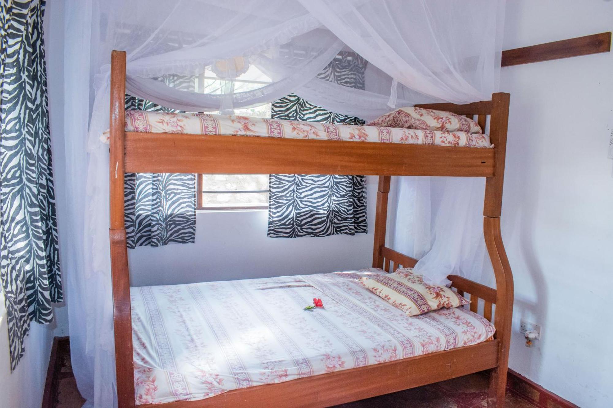Kijani Cottages In Diani Диани-Бич Экстерьер фото