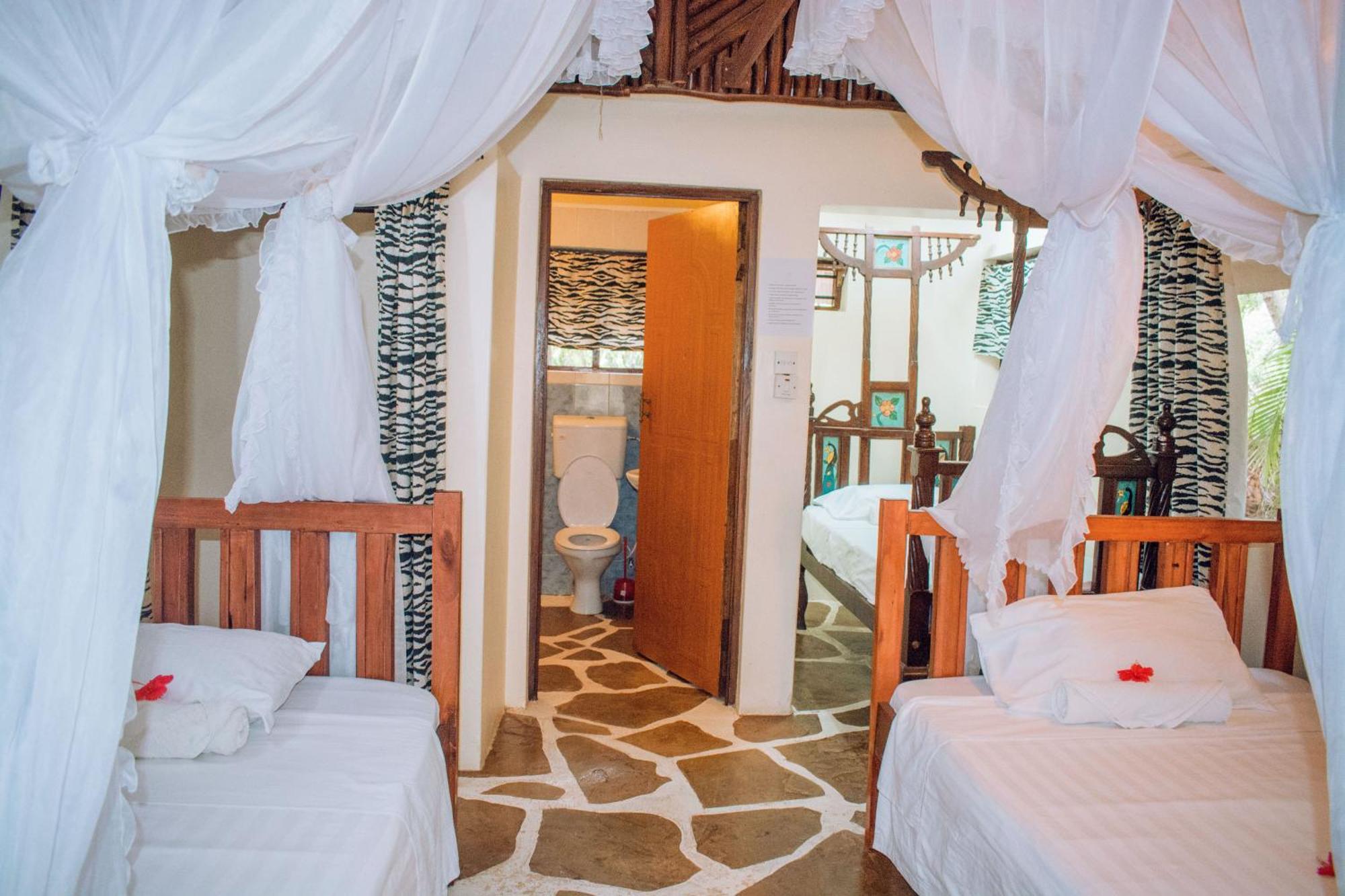 Kijani Cottages In Diani Диани-Бич Экстерьер фото