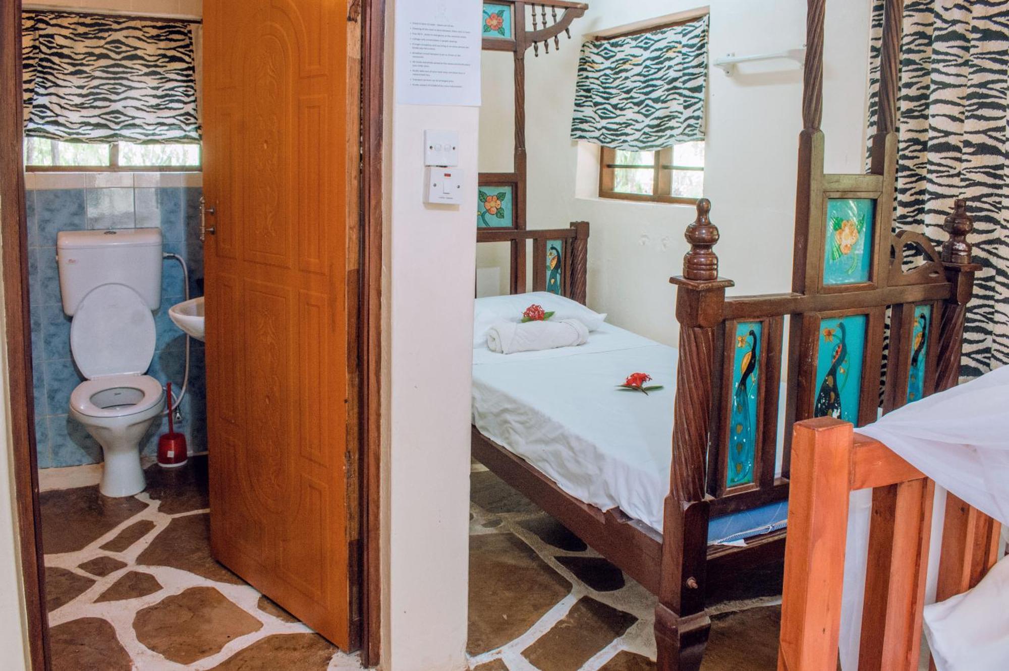 Kijani Cottages In Diani Диани-Бич Экстерьер фото