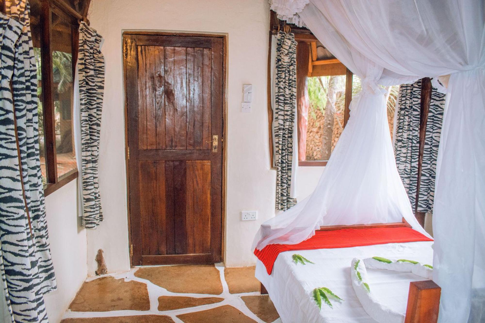 Kijani Cottages In Diani Диани-Бич Экстерьер фото