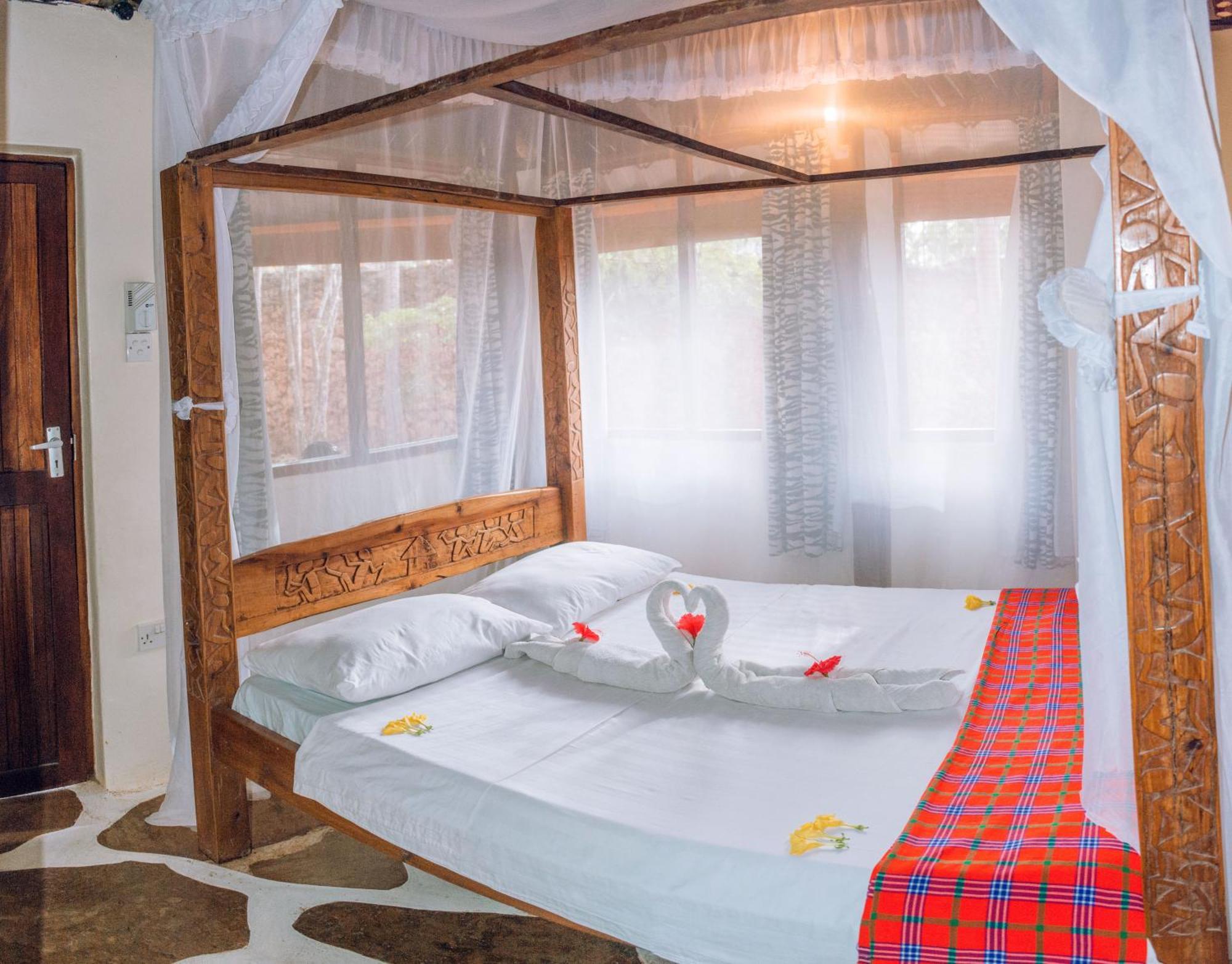 Kijani Cottages In Diani Диани-Бич Экстерьер фото