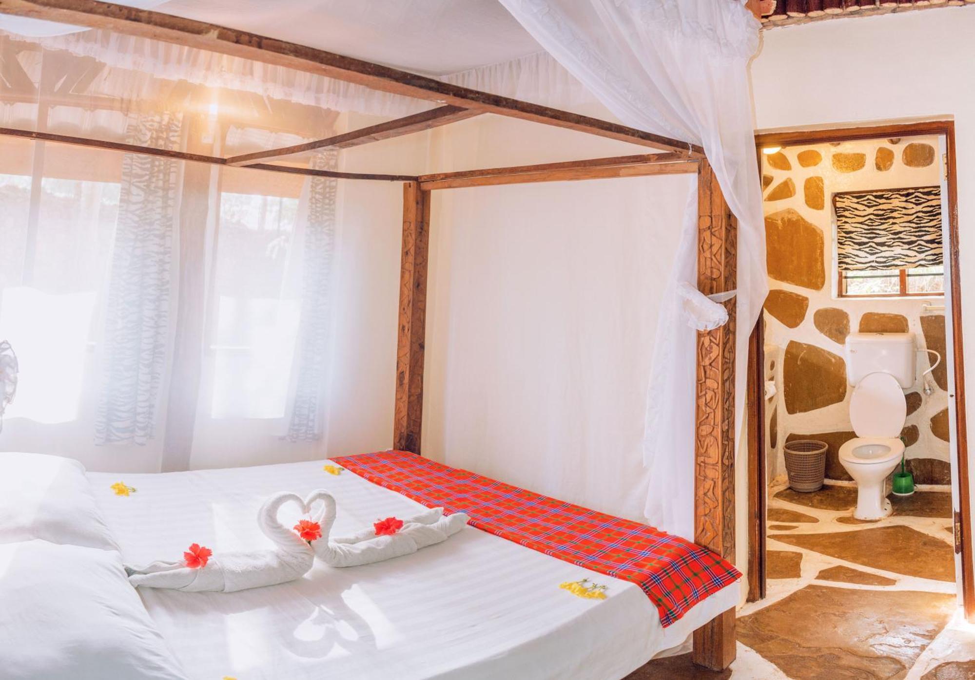 Kijani Cottages In Diani Диани-Бич Экстерьер фото